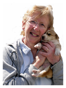 Rosemarie holding a puppy